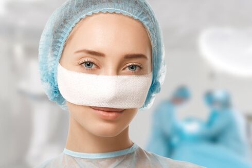 Bandage fixed on the nose during rehabilitation after rhinoplasty.